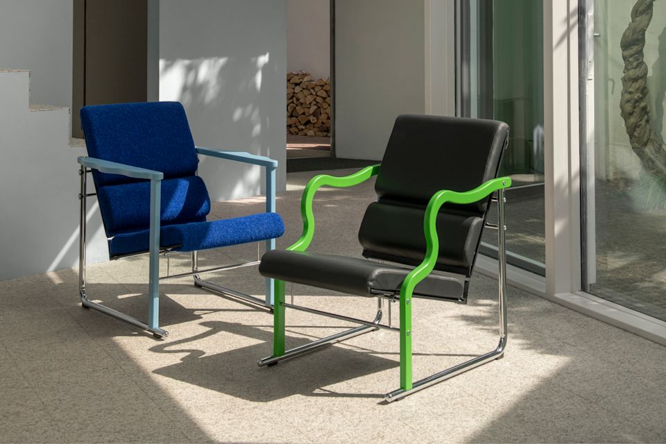 A lifestyle image of a lounge scene featuring Experiment Chair.