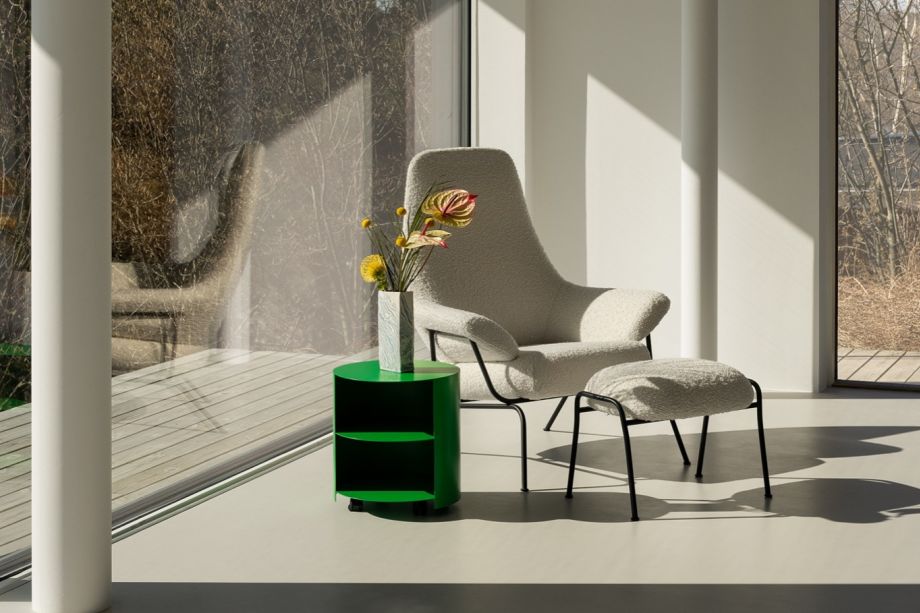 A lounge scene featuring Hai Lounge Chair + Ottoman Eggshell and Hide Side Table Pure Green.
