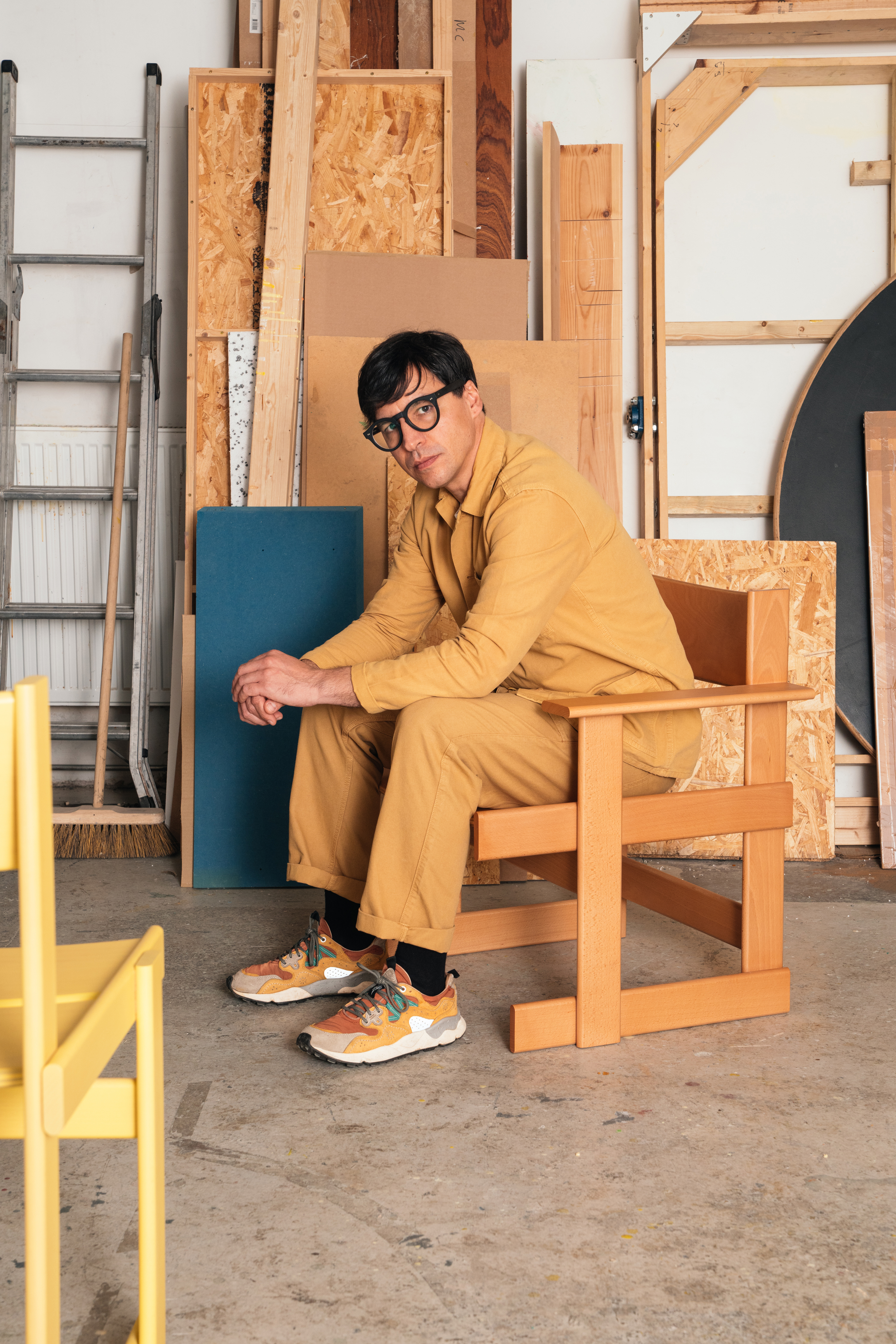 Marco sitting in [Bullnose Lounge Chair Natural](/furniture/sofas-and-poufs/palo/20364).