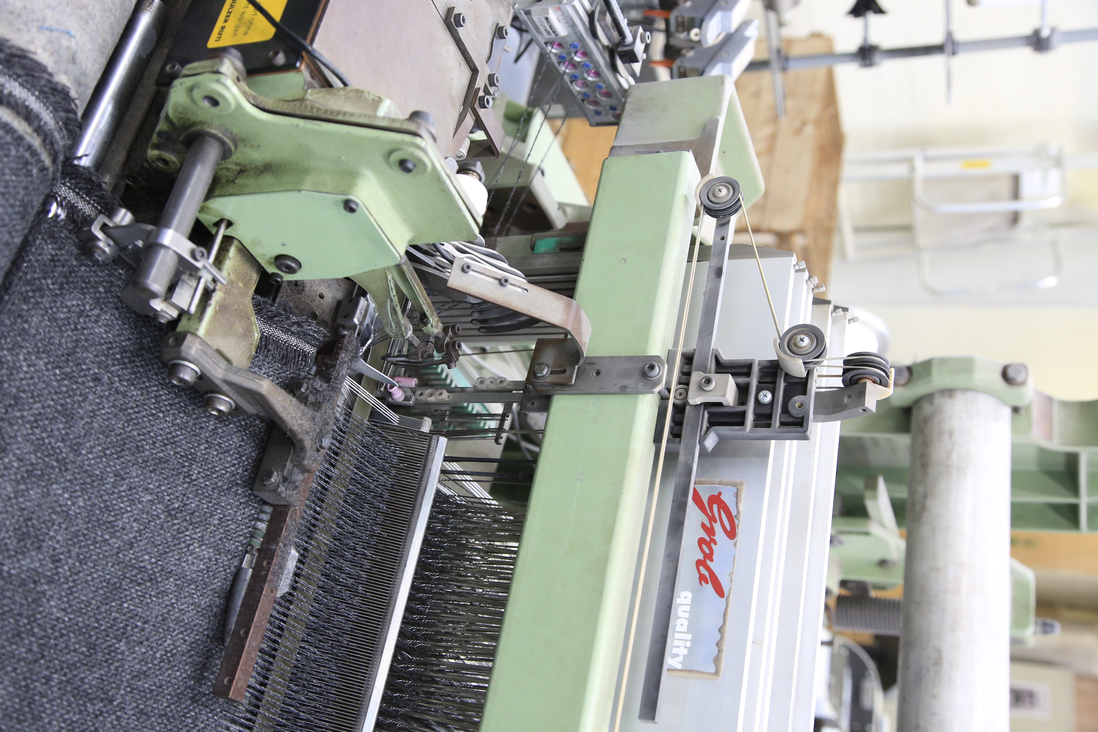 An editorial image from behind the scenes at the Palo Sofa textile factory.