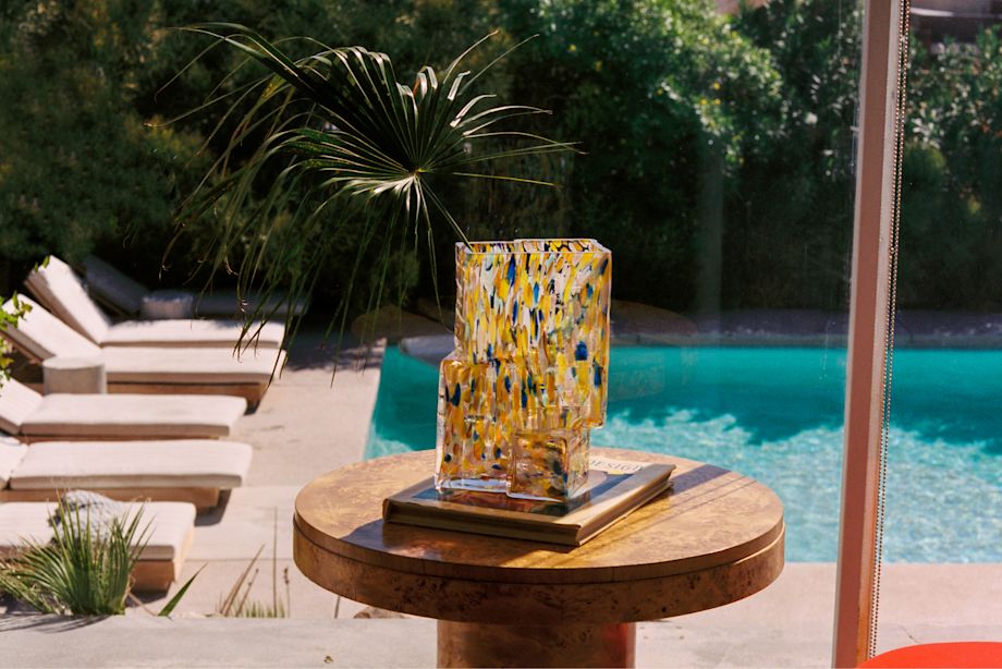 A lifestyle image of a lounge scene featuring Brute Vase Confetti.