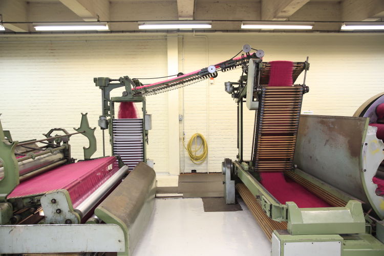 An editorial image from behind the scenes at the Palo Sofa textile factory.