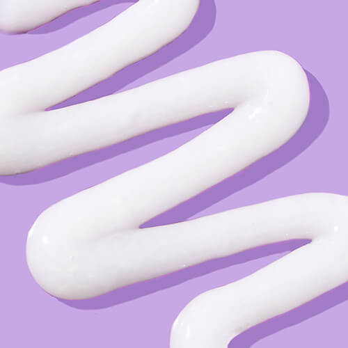 Foamy product across a lilac background