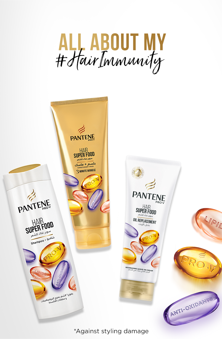 A picture of the Pantene super food shampoo, conditioner, and oil replacement bottles with a text 'all about my #hairimmunity'.