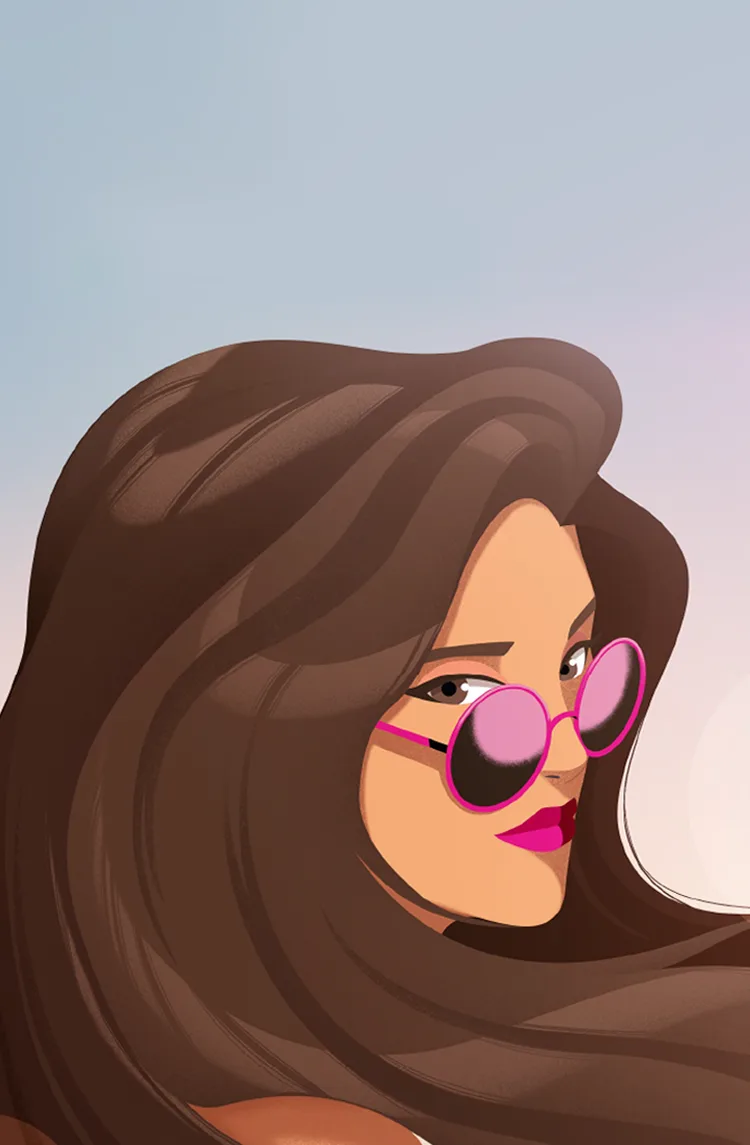 A woman with long thick hair wearing sunglasses