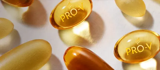 Pantene Pro-V Vitamin illustrated into a golden tablet