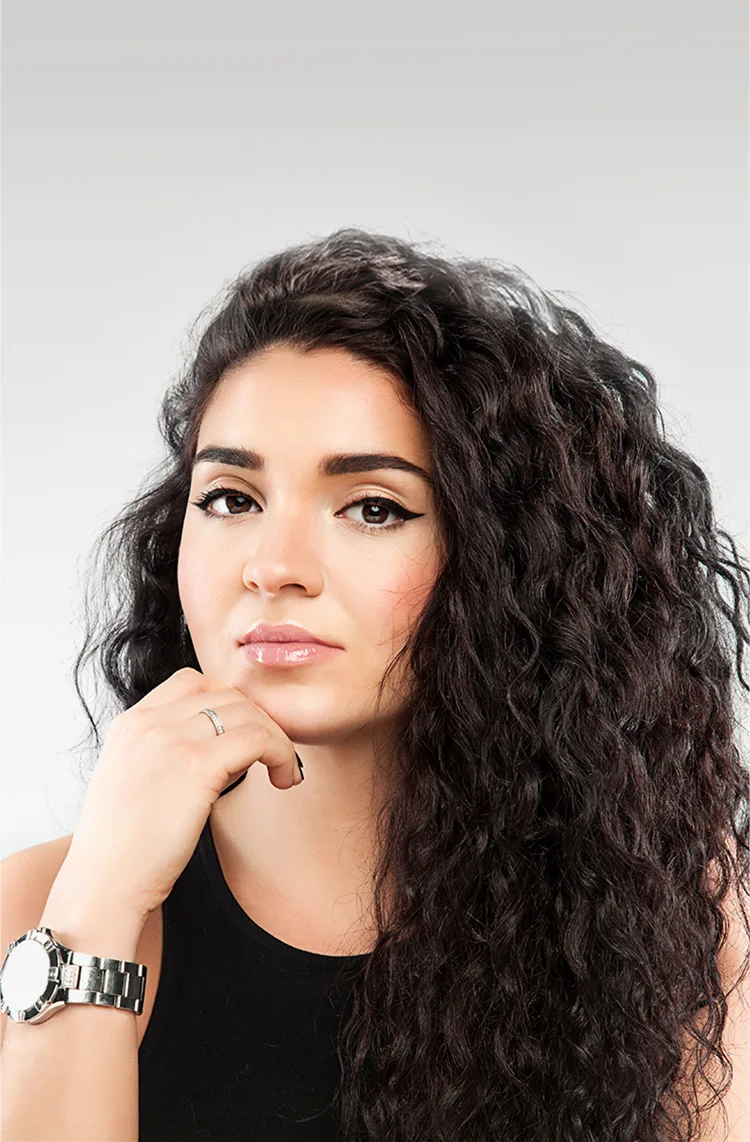 girl looking forward with curly black hair