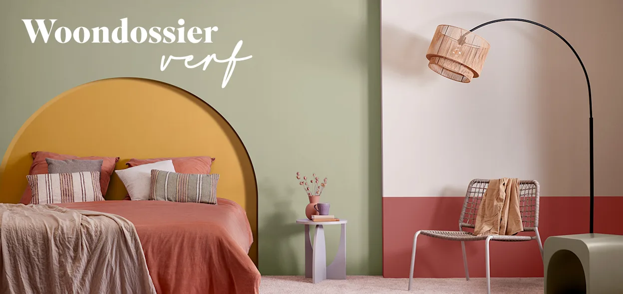 Woondossier verf, kleurrijke muur met groen, geel, terra en roze