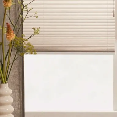 Beige plisségordijnen