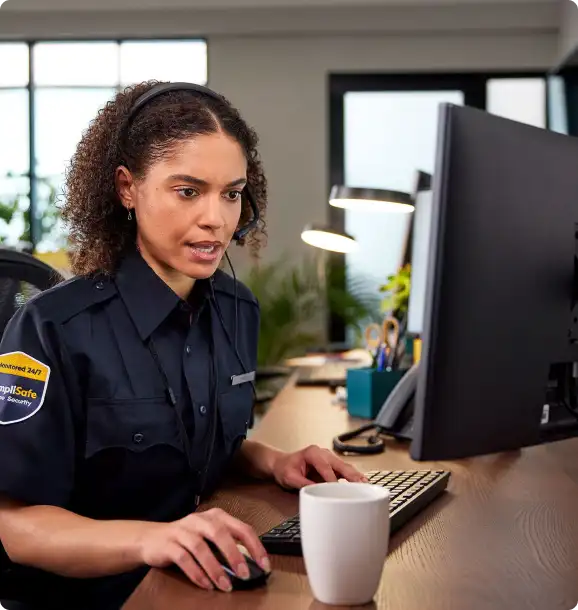 Image of a monitoring agent actively deterring an intruder