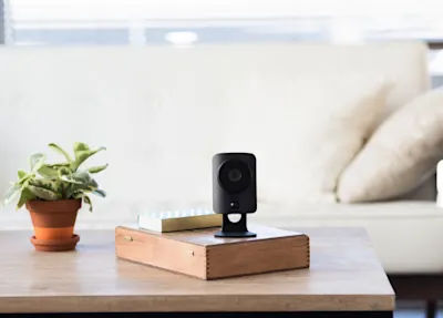 Image of a Simplicam on a coffee table in a home