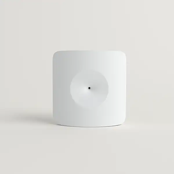 Image of a glassbreak sensor on a solid white background