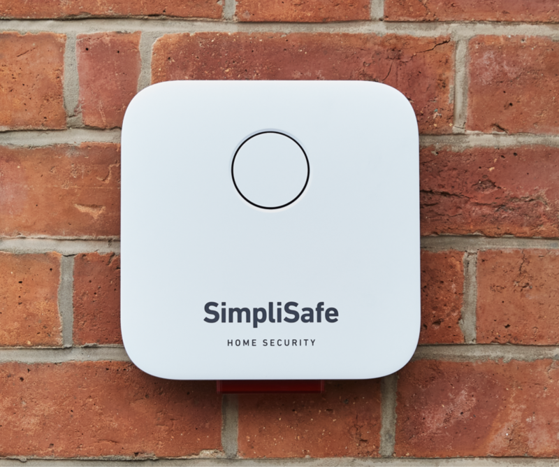 SimpliSafe Bell Box on a brick wall