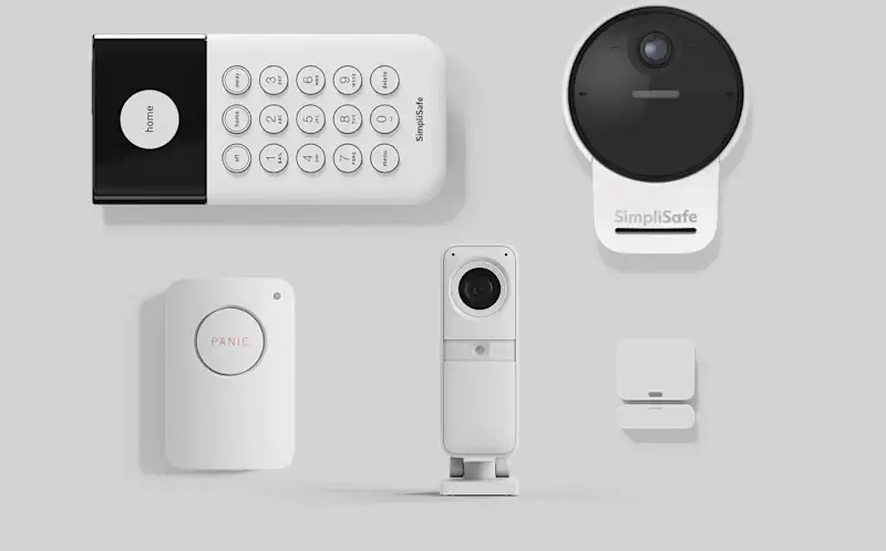Image of home security sensors including a keypad, entry sensor, panic button, indoor camera and outdoor camera
