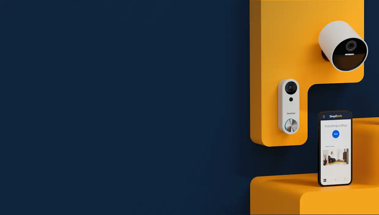 Simplisafe doorbell, outdoor camera, and cellphone with the Simplisafe App opened up