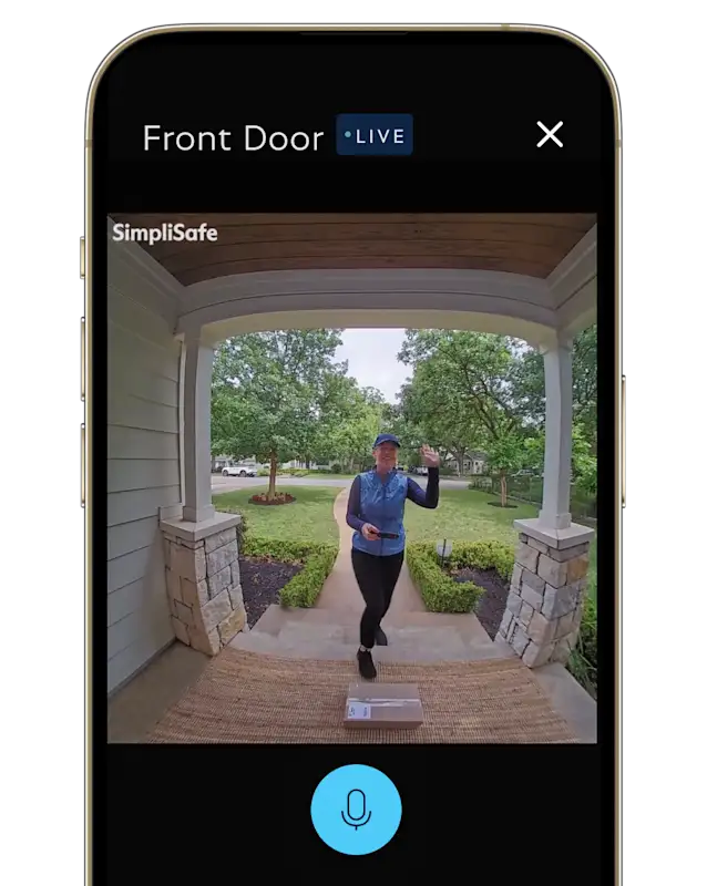 Live camera view of the Front Door showing a delivery person waving on the porch, with a package at her feet. A LIVE badge appears next to the camera name, and a microphone button is shown at the bottom for two-way talk.