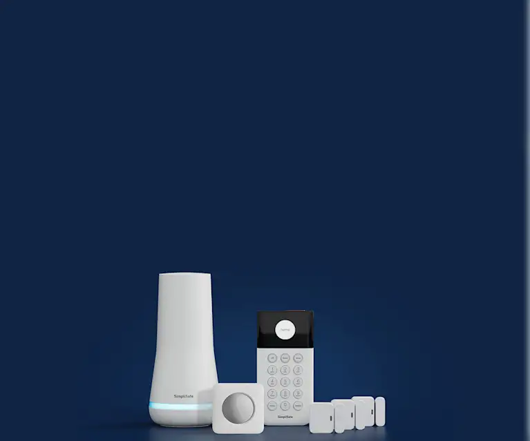 Image of a home security system including a base station, keypad, motion sensor and 3 entry sensors