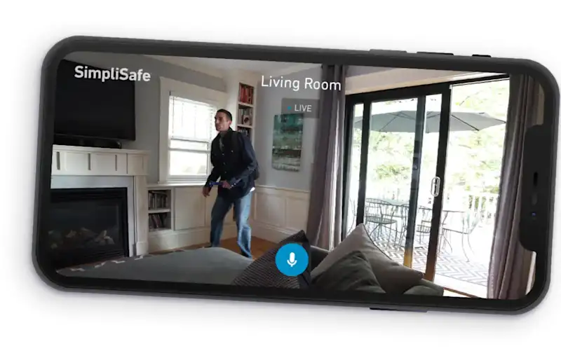 Image of a phone using the SimpliSafe app to watch an intruder in the home via the indoor security camera