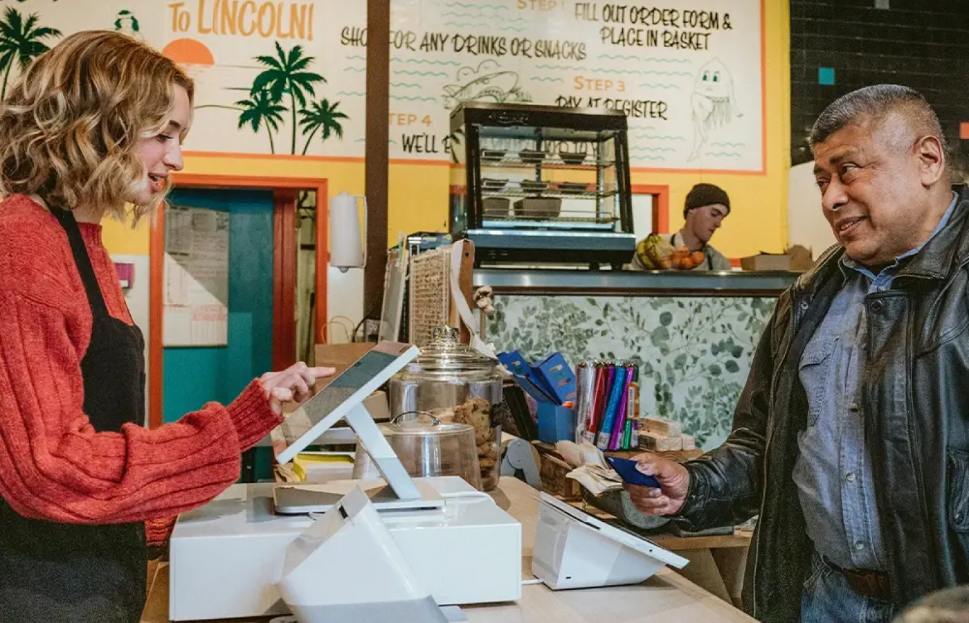 Clover point of sale transaction in a sandwich shop.