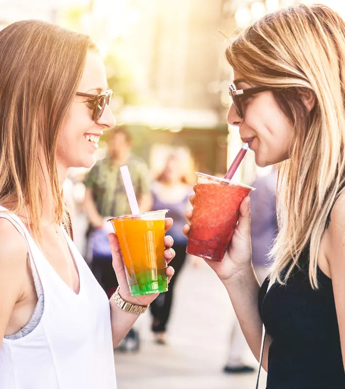 Friends drinking different types of boba tea together