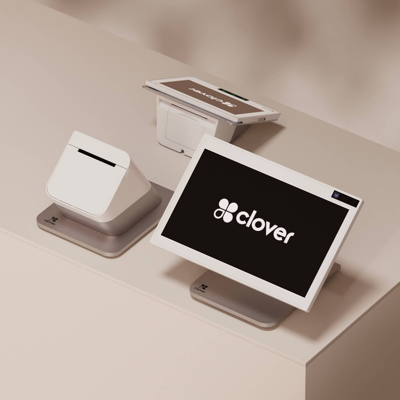 Station Duo with a black screen that reads: "Clover" with a clover logo written in white letters.