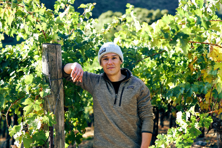 Martin Bernal Hafner standing in vineyard