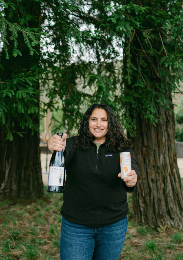 Terah Bajjalieh with Orange Wine Can and Bottle, Photo by Alison Rae Photography 
