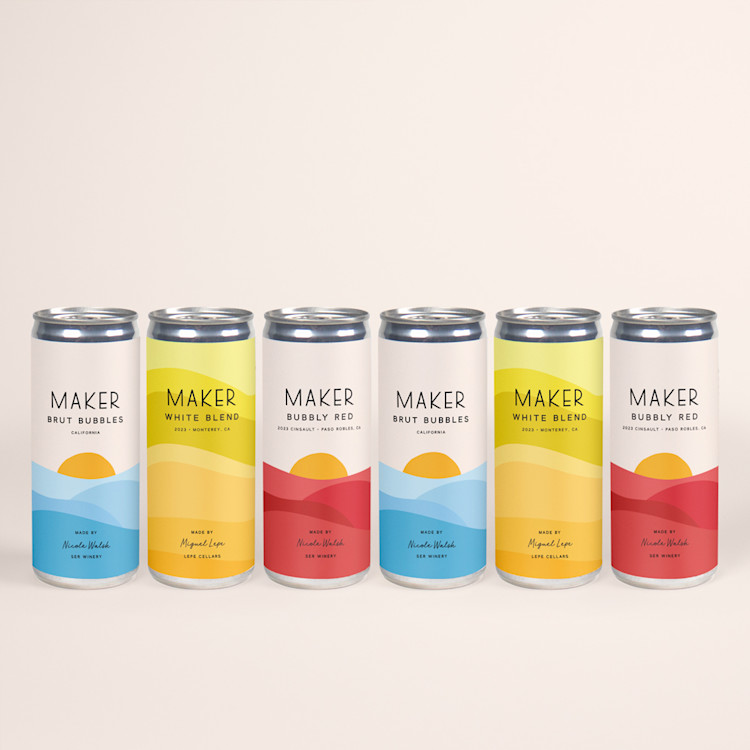 6 cans of wine lined up next to one another