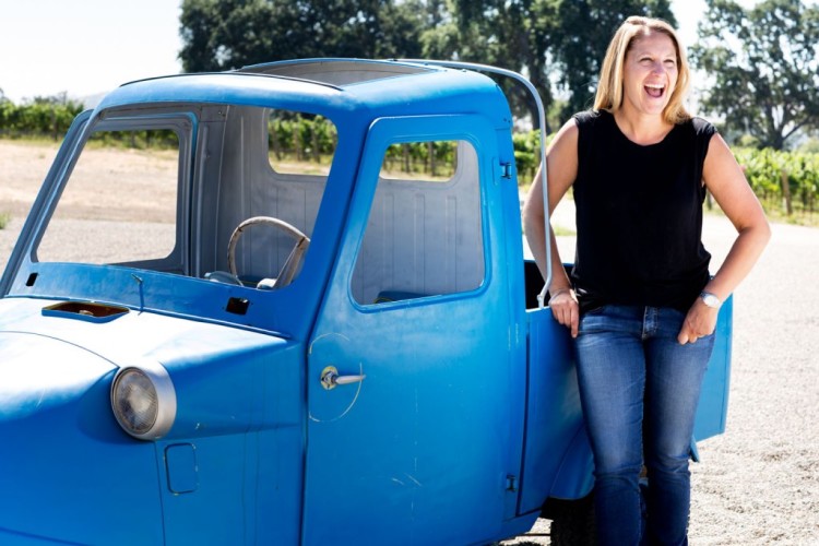 Janell Dusi, founder and winemaker at J Dusi, with her signature blue truck.