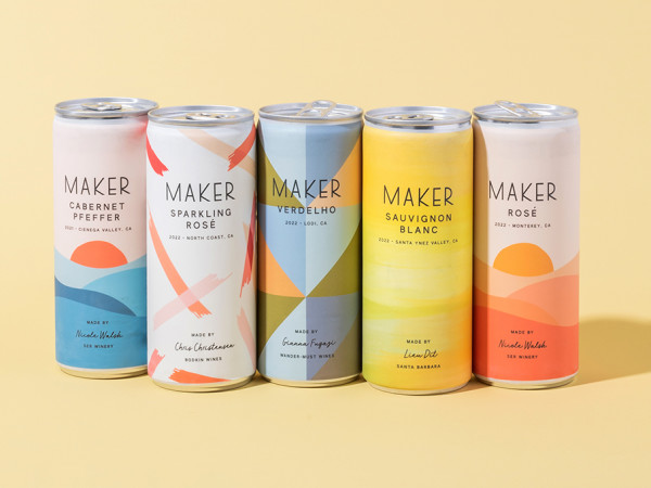 Five Maker Wine cans against a yellow background.