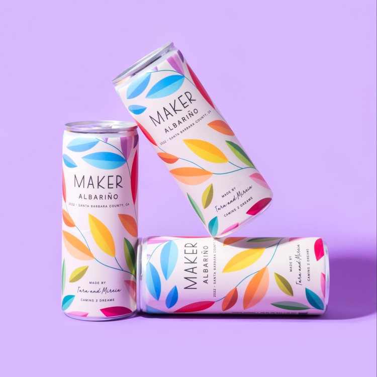 three cans of maker albariño with rainbow design and purple background