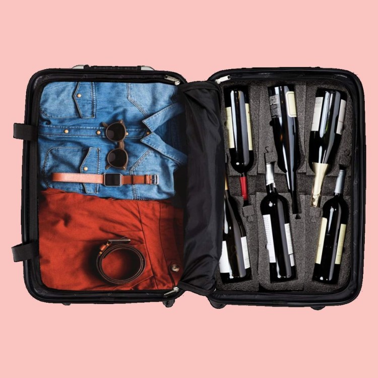 The VinGardeValise Piccolo Wine Suitcase with bottles of wine.