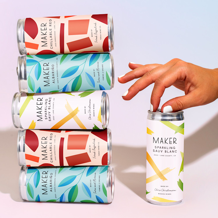 Red White Blue Mixed Pack of canned wine stacked on top of one another