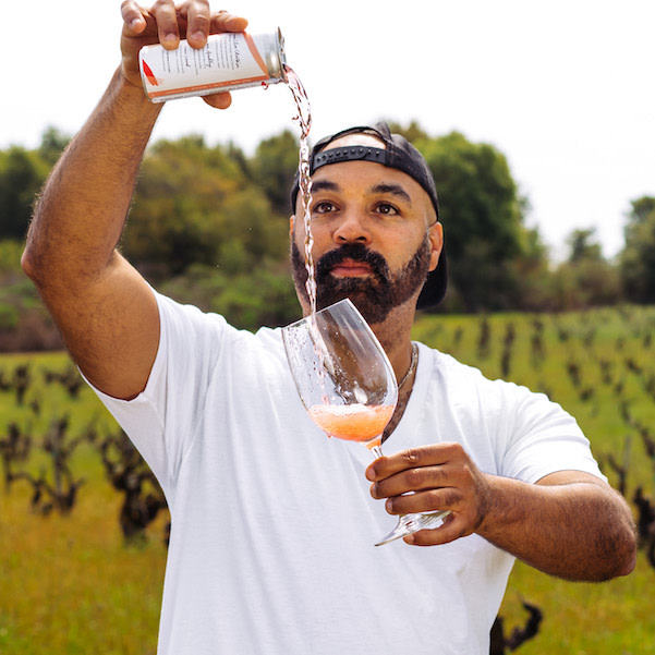 Chris Christensen pouring Maker + Bodkin Sparkling Rose Wine.