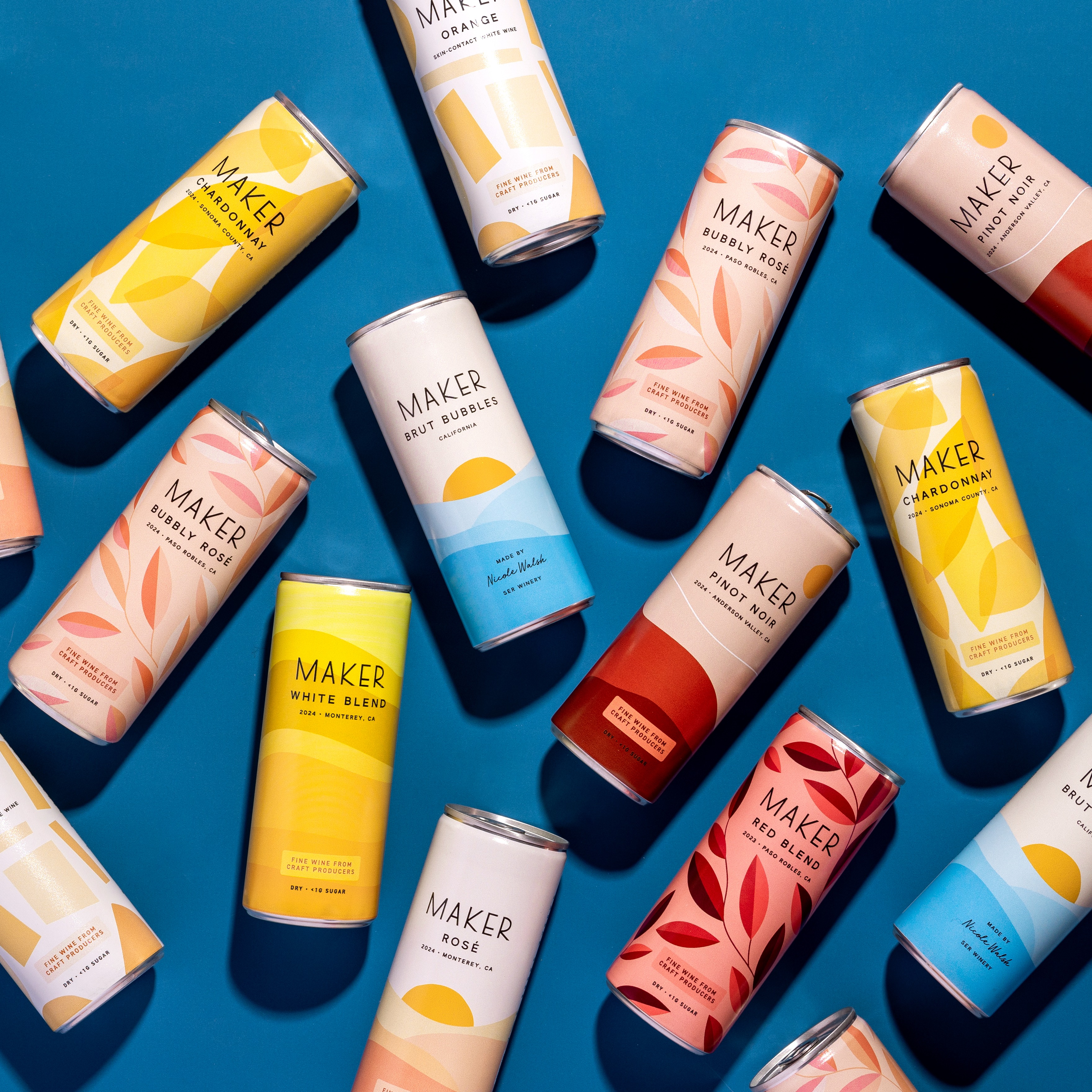 many cans on blue background