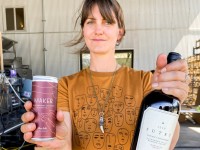 Alice Sutro with Cabernet Sauvignon can and bottle