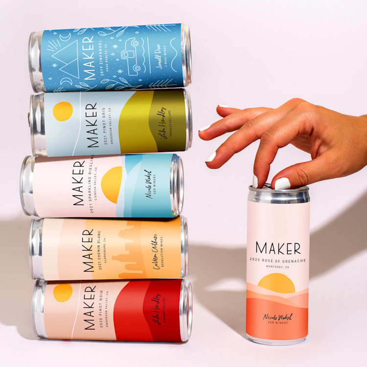 Canned Wine Mixed Pack - hand with cans