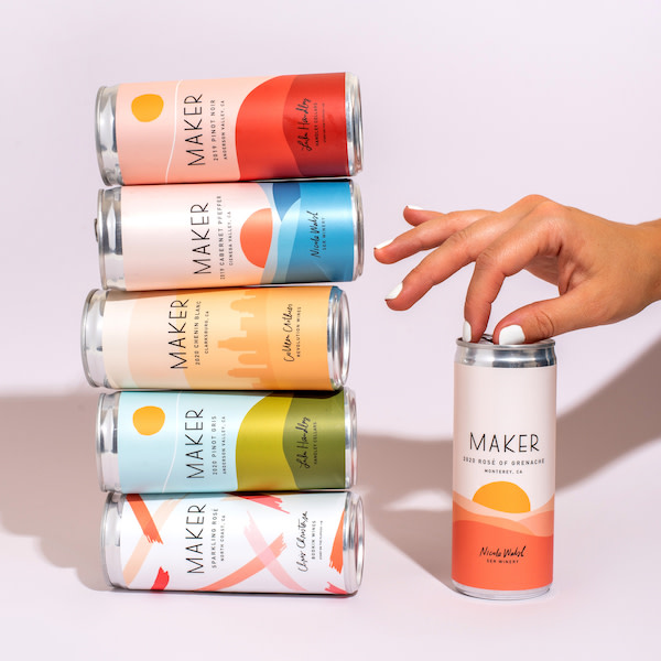 A selection of premium canned wines by Maker and a hand opening them.