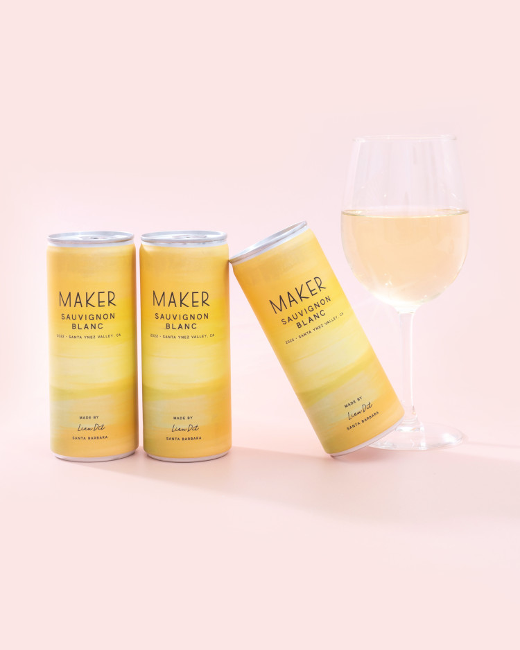 Maker Sauvignon Blanc with glass and leaning can