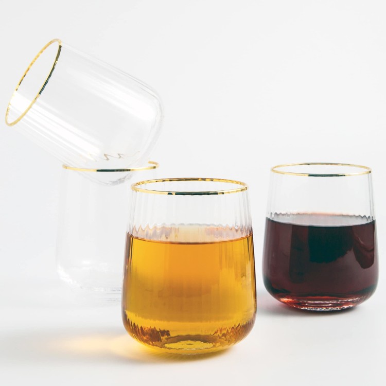 Four glasses with gold rims