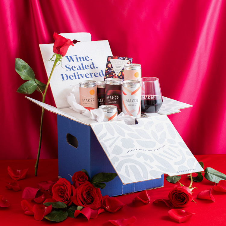 An image of the Valentine's day pack with red wine, chocolate, and a Govino glass.