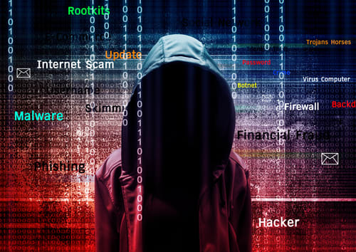 a hooded character surrounded by binary code