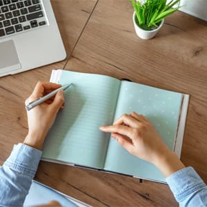 writing notes in a book