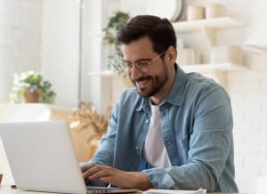 a man working on his laptop