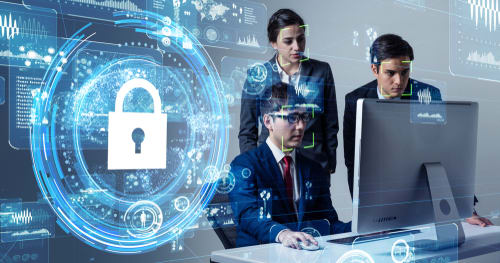 3 people working on a computer with a padlock symbol next to them