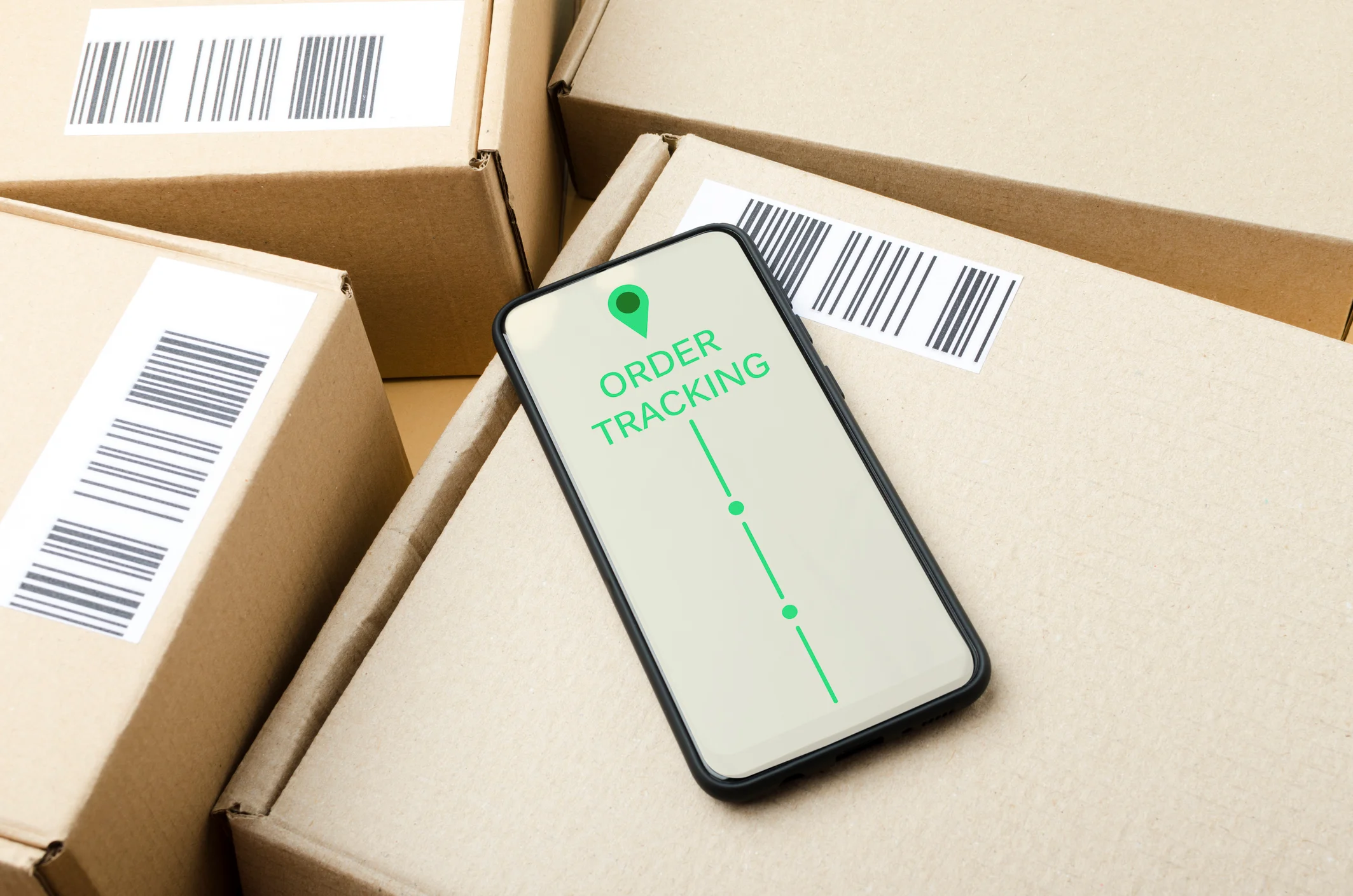 Phone on parcel with tracking