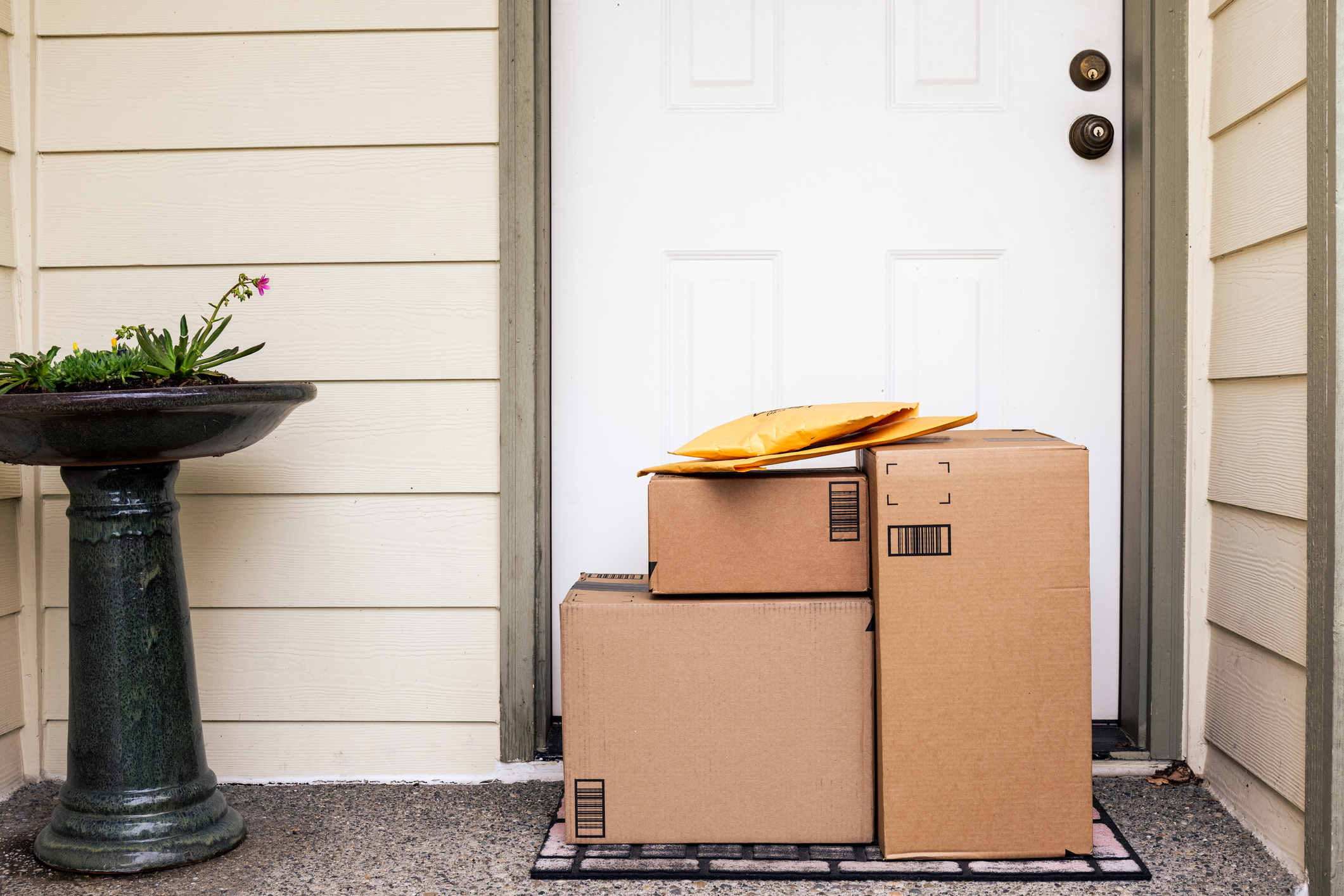 stack of parcels at door