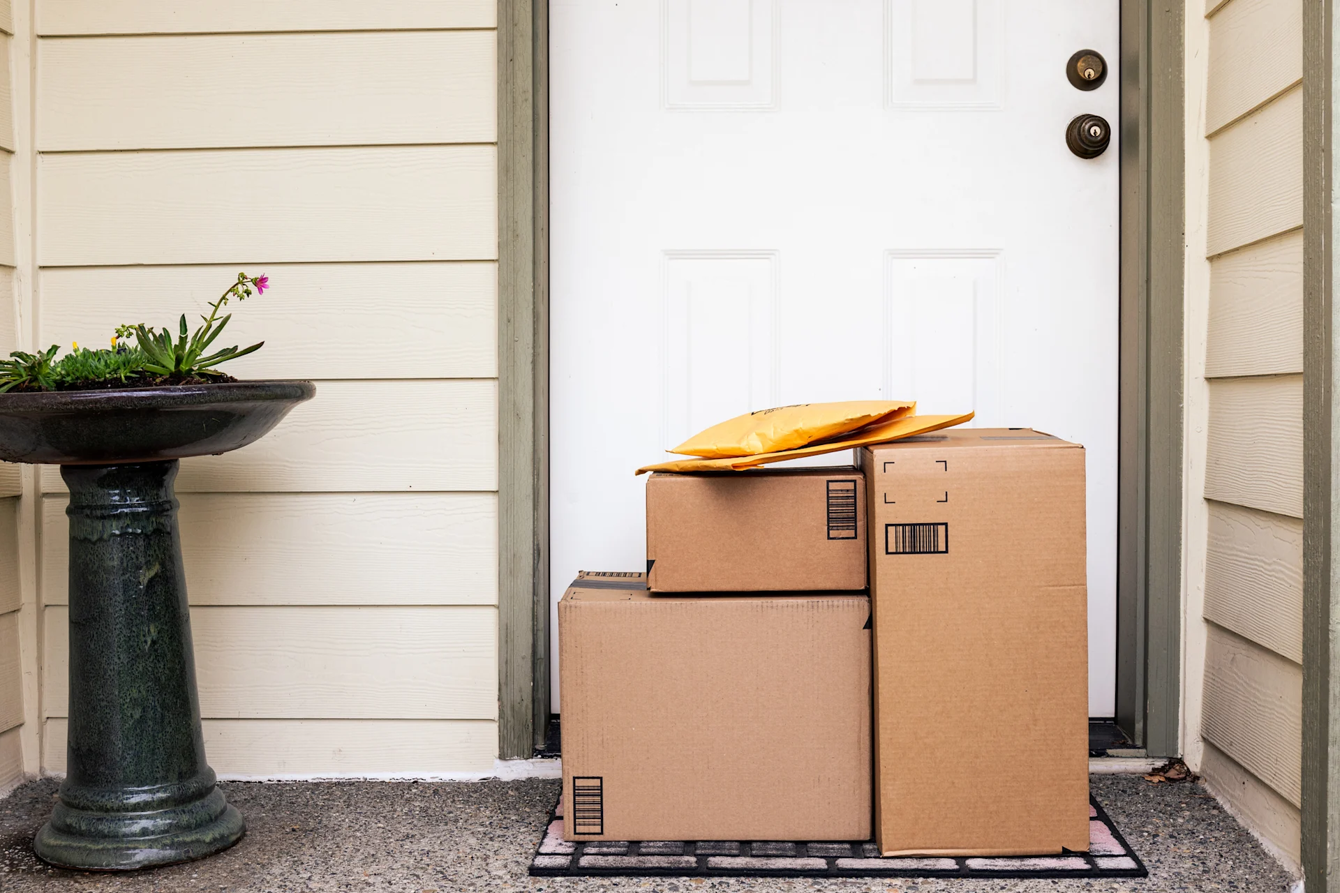 stack of parcels at door