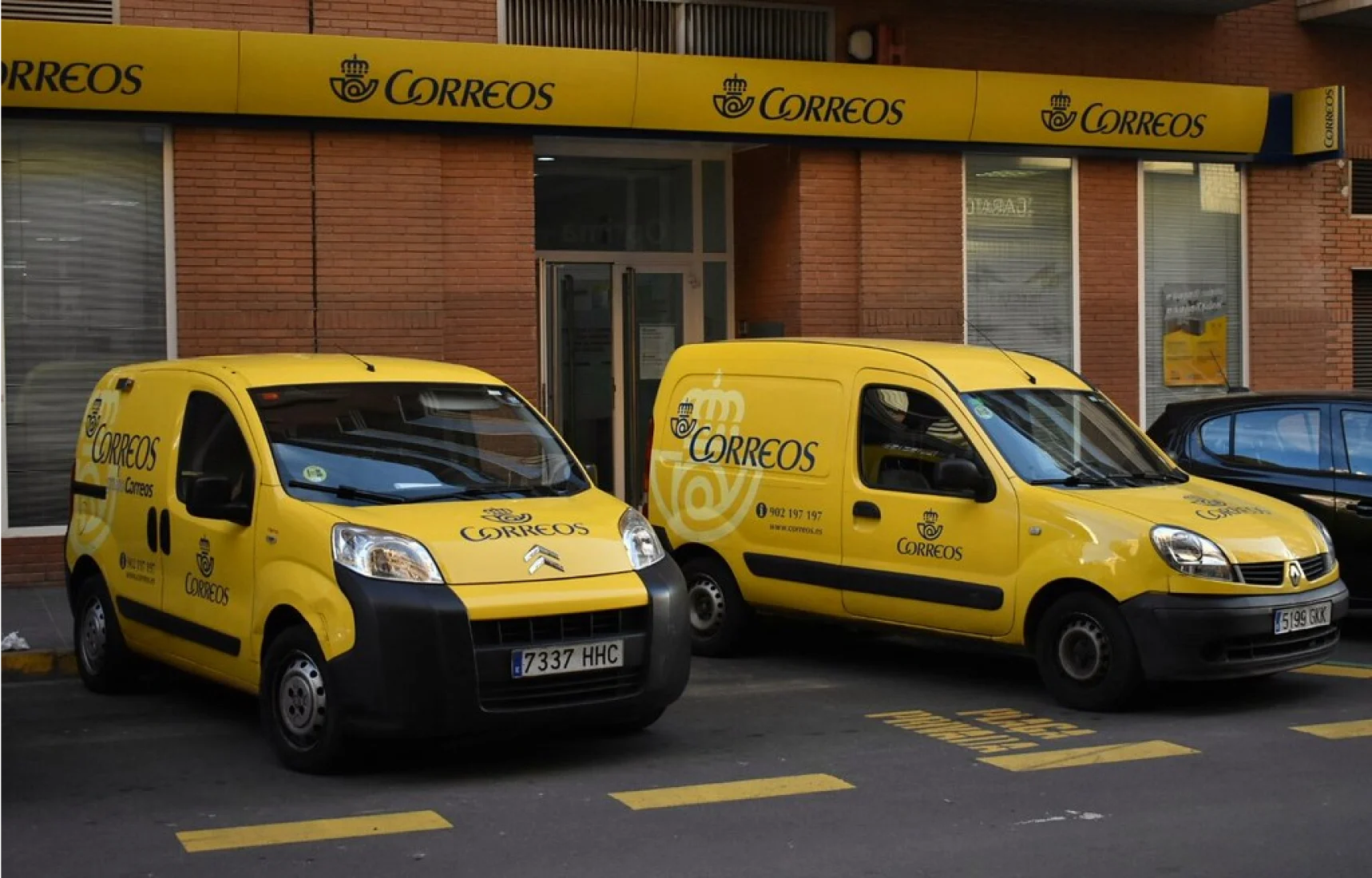 Correos courier vans parked in depot
