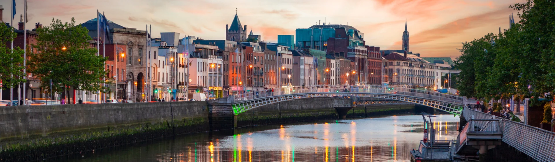Image of Dublin bridge in the evening. Pink skies.